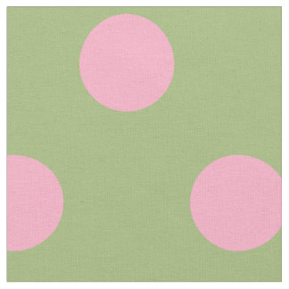 Roze polka stippen op een groene achtergrond. stof