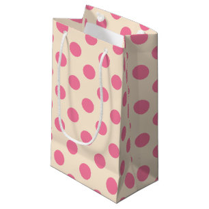 Roze polka-stippen op roomkleine cadeautas