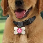 Roze pootafdruk hondenbot monogram huisdieren naamplaatje<br><div class="desc">Houd je pup veilig en stijlvol met deze botvormige hondenidentificatieplaat met een roze pootafdrukcirkel met de naam van de hond,  het telefoonnummer en de contactgegevens van de eigenaar. De geborstelde zilveren botvorm en het levendige roze accent maken het gemakkelijk te herkennen aan elke halsband. Alle tekst is volledig aanpasbaar.</div>