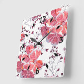 Roze rode bloemen op wit. vierkante klok (Hoek)