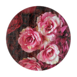 Roze, rode rozen: stof achtergrond. snijplank