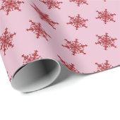 Roze/rode sneeuwvlok cadeaupapier (Rol Hoek)
