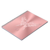 Roze ronddraaistaart met gestileerde vlinder, met  notitieboek (Linkerzijde)
