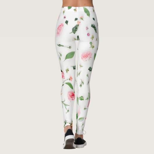 Roze roos en bladeren op witte achtergrond leggings (Achterkant)