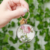 Roze roos knoopsluiting aan sleutelhanger (Hand)