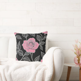 Roze roos op zwart kussen