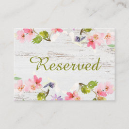 Roze roze flessen op wit hout voorbehouden plaatskaartje