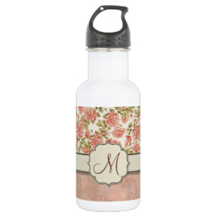 roze rozen en marmer met monogram waterfles