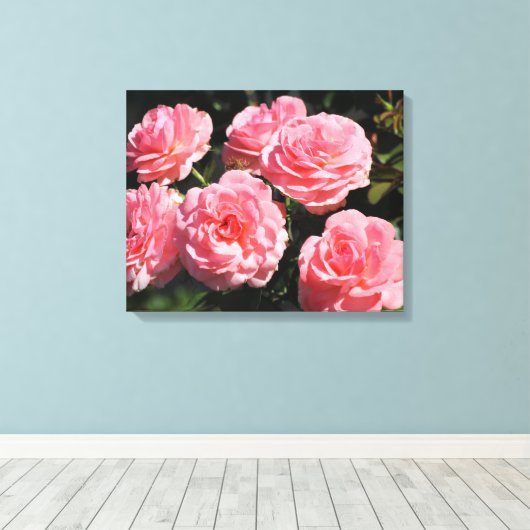 Roze rozen in bloei canvas afdruk (Insitu (Houten vloer))