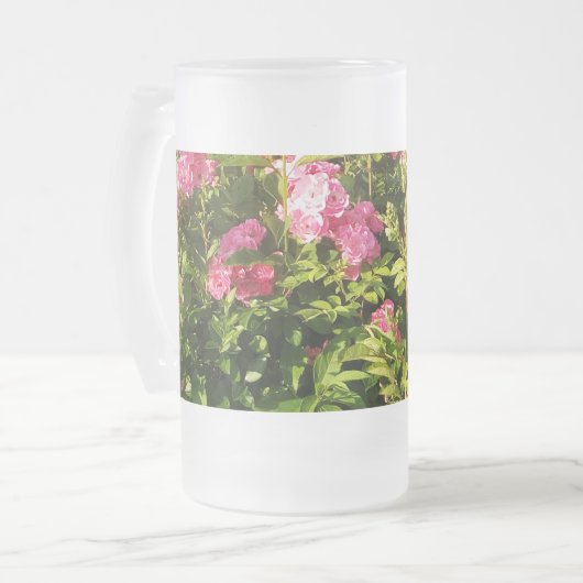 Roze rozen in bloei matglas bierpul (Voorkant links)