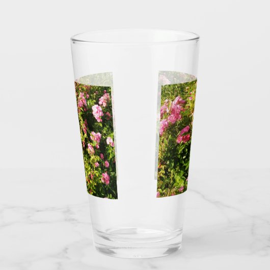 Roze rozen in het bloedbad glas (Links)