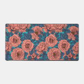 Roze rozen met blauwe bladeren op blauw bureaumat (Voorkant)