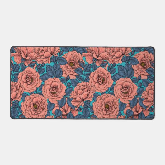 Roze rozen met blauwe bladeren op blauw bureaumat (Voorkant)