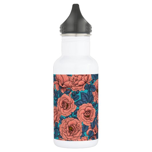 Roze rozen met blauwe bladeren op blauw waterfles (Links)