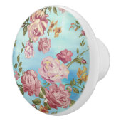 Roze rozen op blauwe achtergrond keramische knop (Rechts)