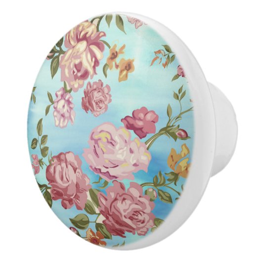 Roze rozen op blauwe achtergrond keramische knop (Rechts)