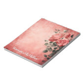 Roze rozen op de roze achtergrond notitieblok (Linkerzijde)