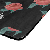 Roze rozen op zwart snijplank (Hoek)