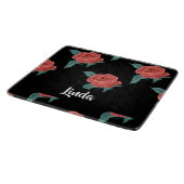 Roze rozen op zwart snijplank (Hoek)