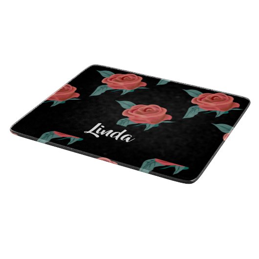 Roze rozen op zwart snijplank (Hoek)