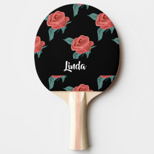 Roze rozen op zwart tafeltennisbatje