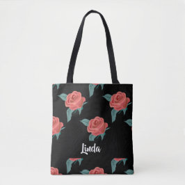 Roze rozen op zwart tote bag