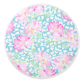 Roze rozen, witte vlinders op blauwe keramische kn keramische knop