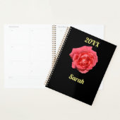 Roze rozenbloem op zwart minimalistisch gebruik planner (Display)