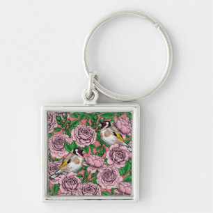 Roze rozenbloemen en goudvink vogels sleutelhanger