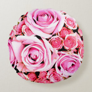 Roze rozenboeket rond kussen