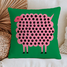 Roze schaap met polka stippen op groene naïeve die kussen