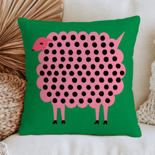 Roze schaap met polka stippen op groene naïeve die kussen