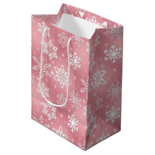 Roze schotel met middelmatige schenkingszak met sn medium cadeauzakje