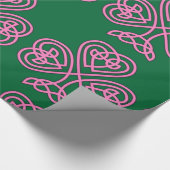 Roze Shamrock op groene achtergrond inpakpapier (Hoek)