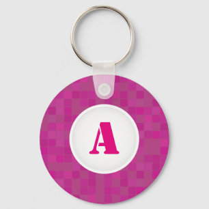 Roze sleutelhanger met pixelaanzin initiaal