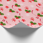 Roze snoepriet en rode kerstaven met lint cadeaupapier (Hoek)