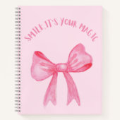 roze spiraal notitieboek met een boog (Voorkant)