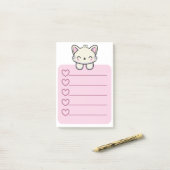Roze Sticky Note met Schattigee Cat op Top (Op bureau)