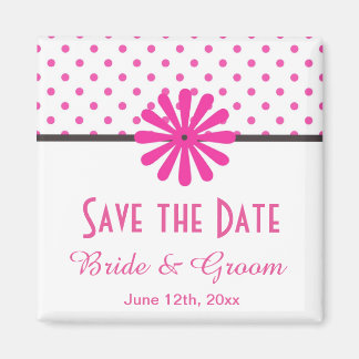 Roze stipjes en bloem op de datum magneet