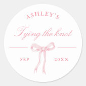 Roze strik die de knoop aandoet favor ronde sticker (Voorkant)