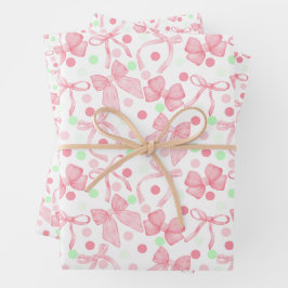 Roze strikken met roze en groene stippen inpakpapier vel