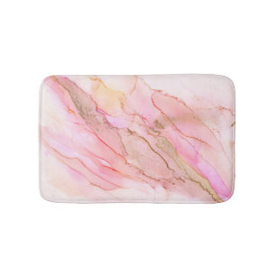 Roze tinten in de kleuren van de inkt met goud badmat