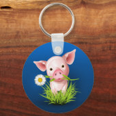 Roze varken met groen gras boven blauw sleutelhanger (Voorkant)