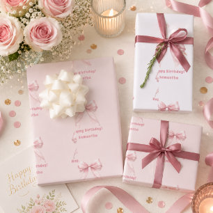 Roze verjaardagsboog witte meisje inpakpapier vel