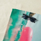 Roze vlamingos drijven in de prachtige oceaan strandlaken (In situ)