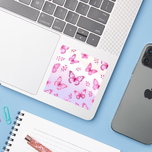 Roze vlinders en bloemenpatroon sticker (Laptop met iPhone)