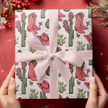 Roze Westerne Howdy Christmas Cowgirl Cadeaupapier<br><div class="desc">Dit leuke en feestelijke Westerne Howdy Christmas Cowgirl-inpakpapier bevat handgetekende illustraties van Xmas-cowgirl-laarzen,  petten,  wanten,  cactussen,  hulstbessen en -sterren. Allemaal tegen een elegante zeer zachte roze achtergrond.</div>
