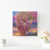 Roze wilde boom op zonsondergang door de vijver vierkante klok (Huis)