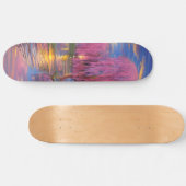 Roze wilgen bij zonsondergang door de vijver persoonlijk skateboard (Horizontaal)