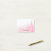 Roze witte eenhoorn post-it® notes (Op bureau)